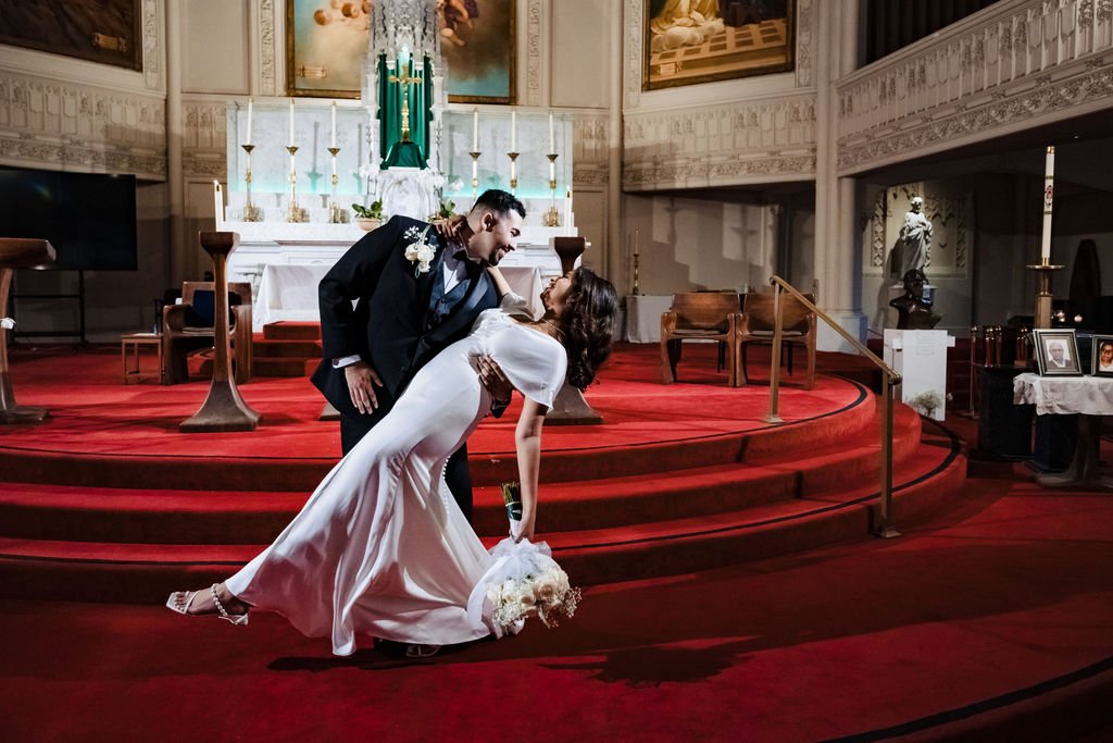 Newlyweds celebrate at the altar of Old St. Mary's Cathedral after the Catholic Nuptial Mass
