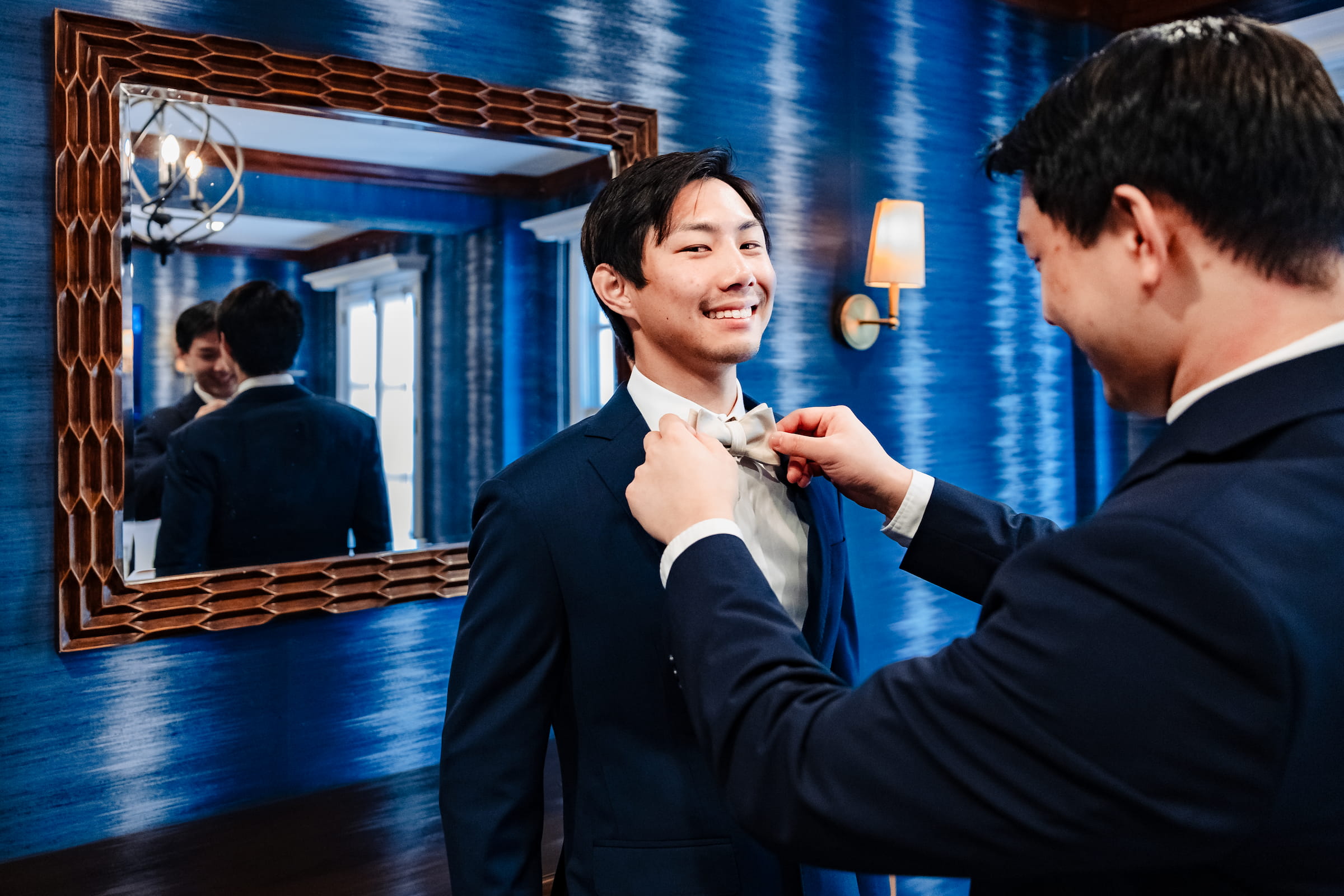 Groom preparing before the Catholic wedding ceremony