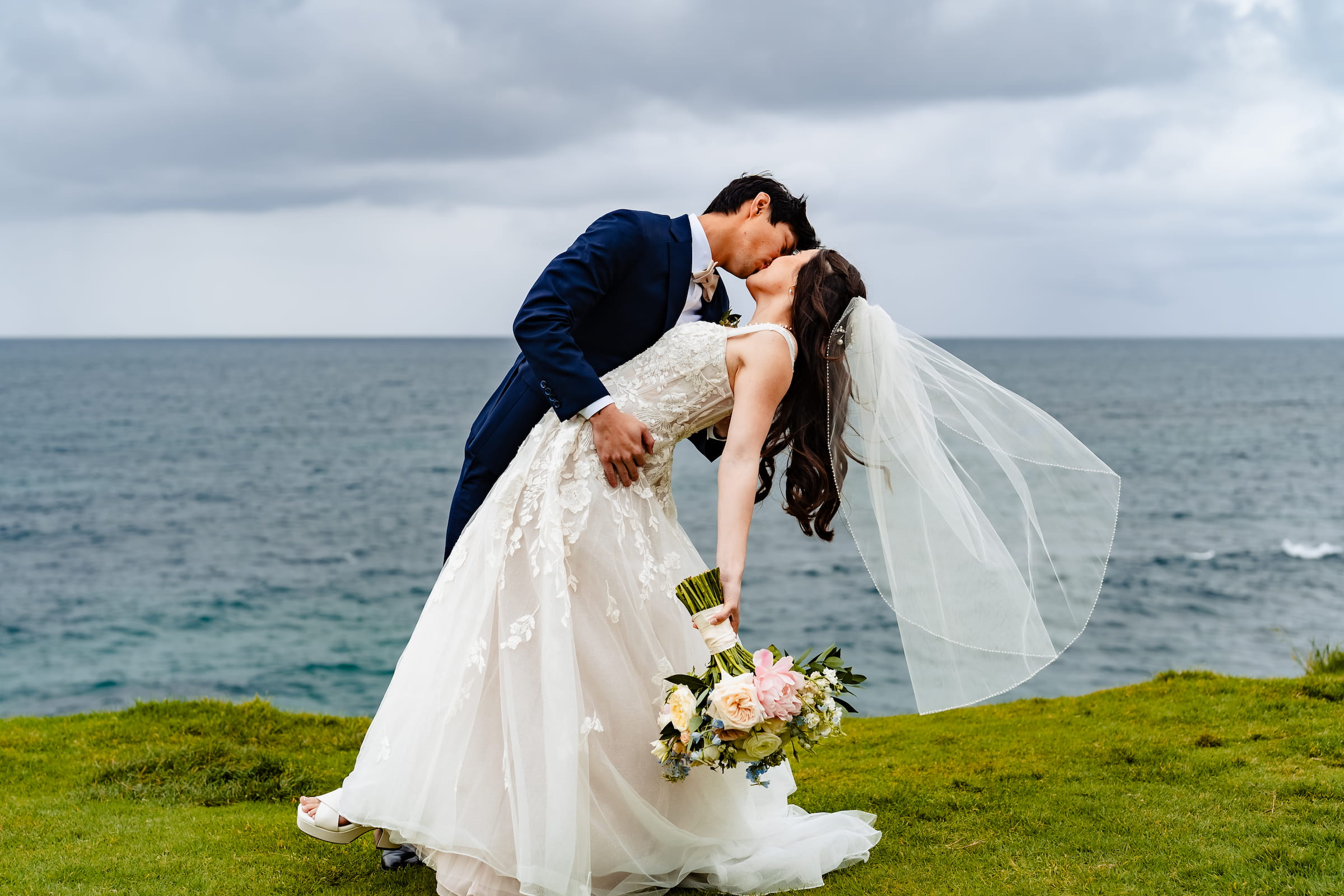 Bride and groom portrait above the La Jolla coast