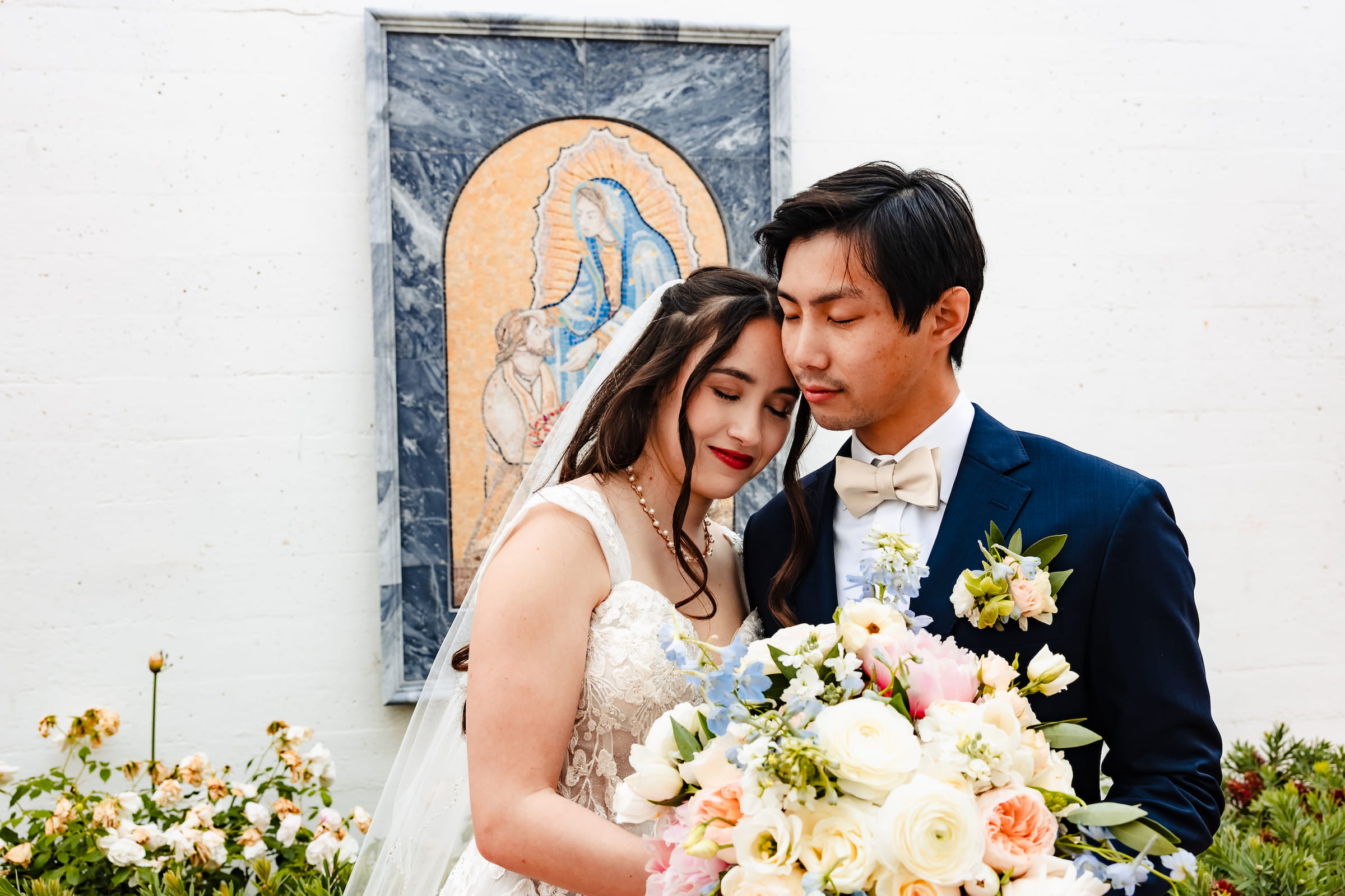 Bride and groom portrait near St Mary's Star of the Sea