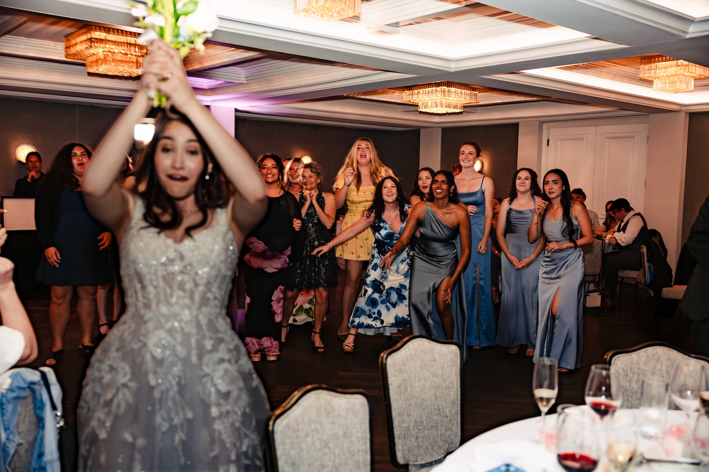Guests celebrating at the Catholic wedding reception