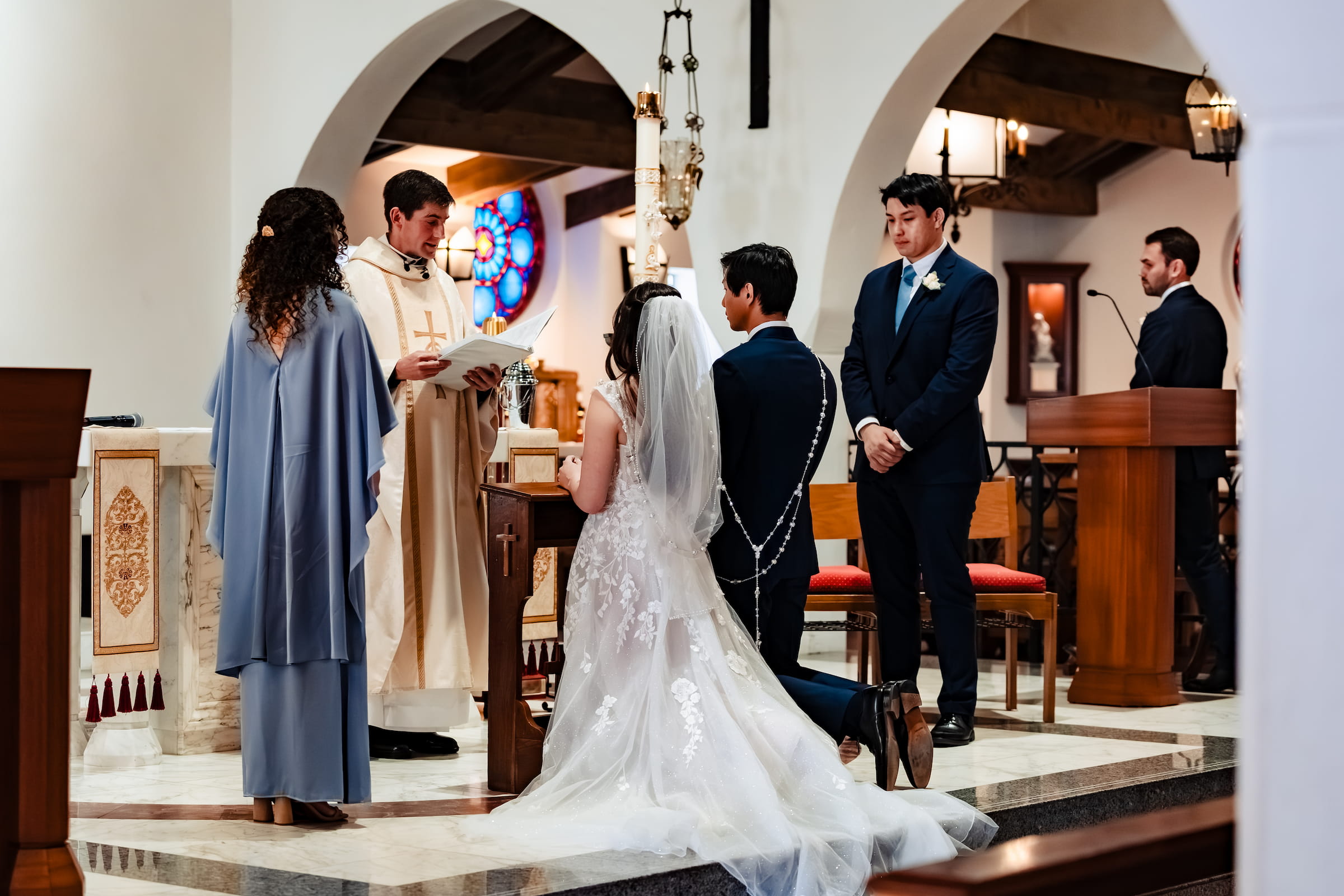 Matthew and Maya at the altar during their nuptial Mass