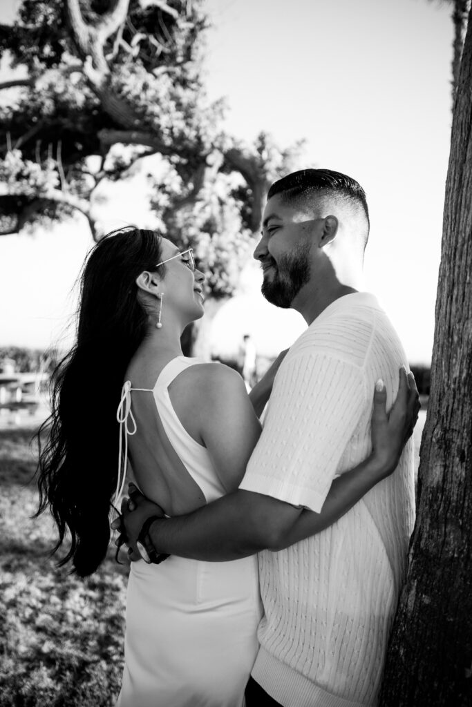 black and white photo of engagement couple holding each other at Treasure Island Laguna Beach engagement session