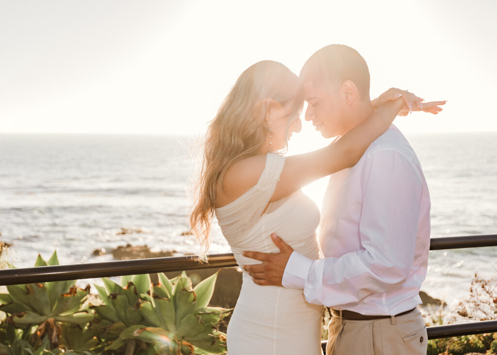 Treasure Island engagement session during sunset at a cliff