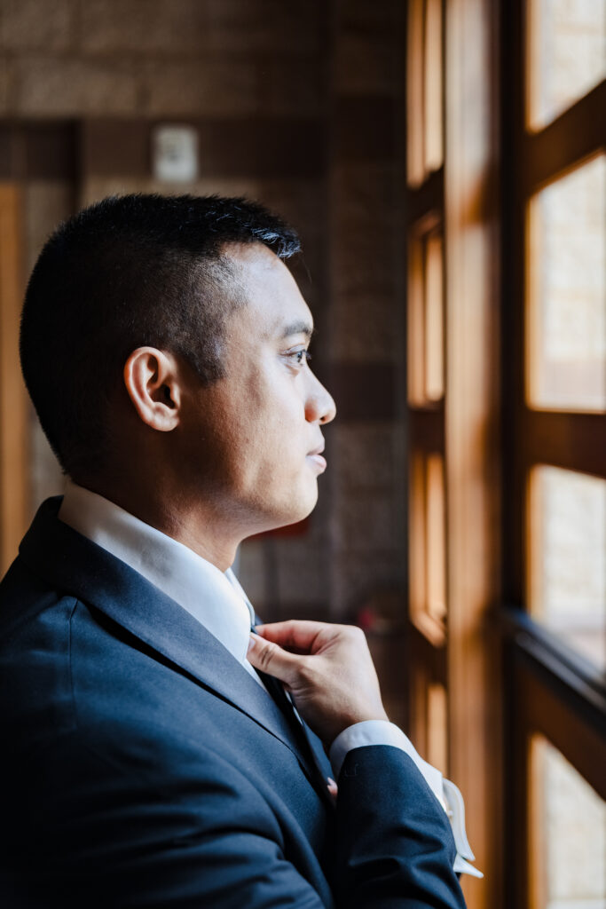 groom before wedding mass at st Martha's parish in murrieta Ca
