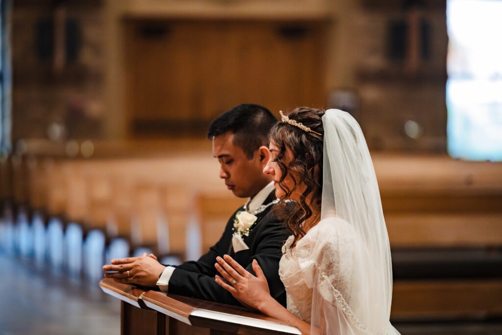 Bride and Groom at the Alter at St Martha's Catholic Parish in Murrieta Ca