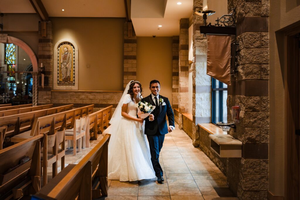 Bride and Groom approaching Our Lady of Guadalupe at St Martha's Catholic Parish in Murrieta Ca