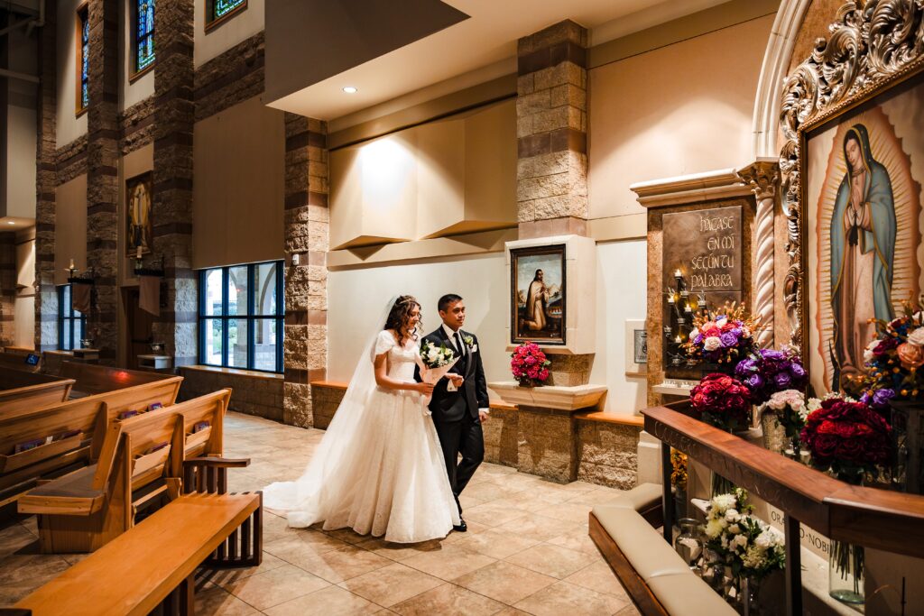 Bride and Groom approaching Our Lady of Guadalupe at St Martha's Catholic Parish in Murrieta Ca