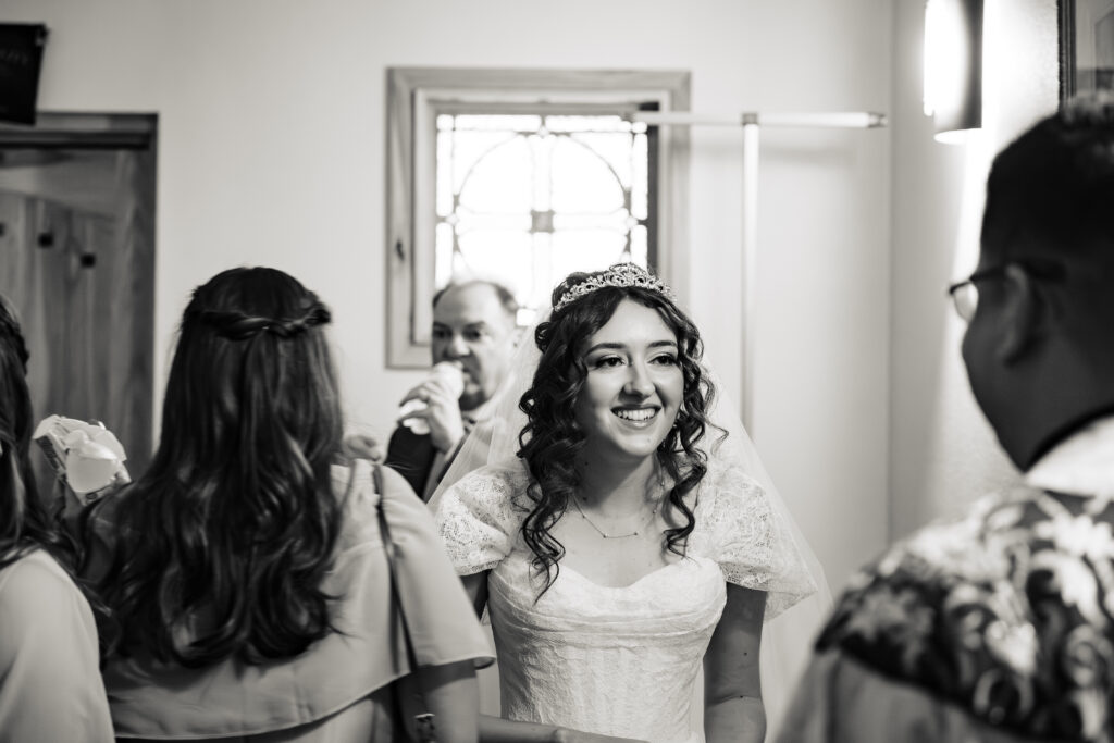 bride before wedding mass at st Martha's parish in murrieta Ca