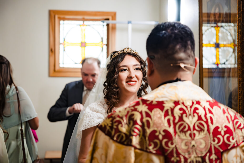 bride before wedding mass at st Martha's parish in murrieta Ca